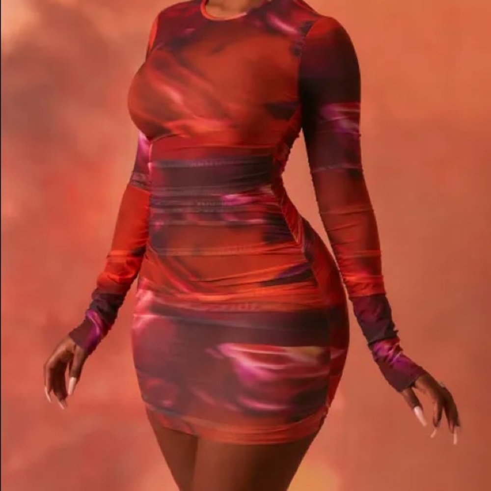 A shaping body-con fit, long sleeve mini dress.